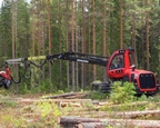 Wheeled Harvester working with logs